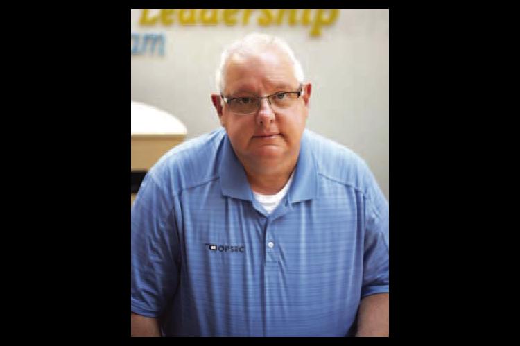 Kingfi sher turns to a familiar face Former longtime principal, AD Andy Evans hired as interim superintendent