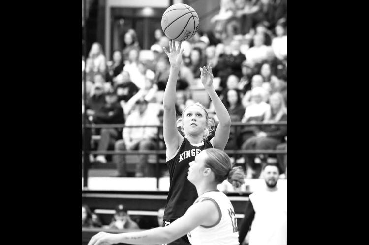 ABBIE MYERS shoots over a Keys defender in Tuesday’s semifinal win. Myers scored 21 points as the Lady Jackets advanced to the championship. [Photo by Russell Stitt/www. stitt.smugmug.com]