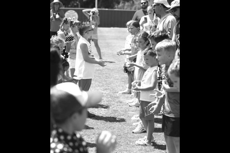 CATCH, PLEASE – Participants prepare to toss (and catch) water balloons during a competition on July 4 at Kingfisher Park as part of the Rotary Club’s annual balloon toss and three-legged sack races. [KT&amp;FP Staff Photo]