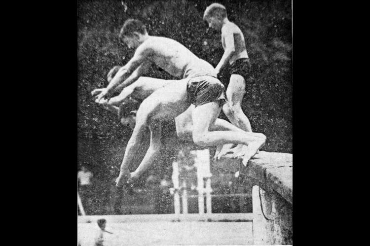 Four boys dive simultaneously into Kingfisher swimming pool, which was opened for the REA picnic Tuesday. The Cimarron Electric Cooperative gave free tickets to members and their families. (Times, Aug. 23, 1951)