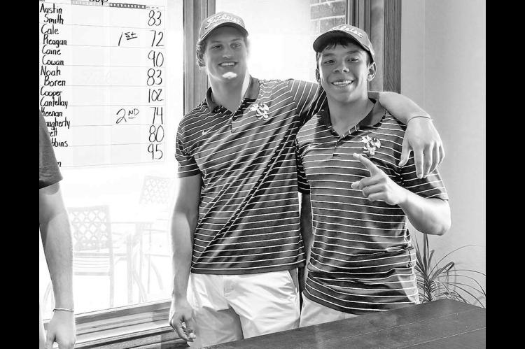 RECENT KHS grads Cale Reagan (left) and Luciano Orozco pose for a pic after completing their rounds at the Classic Bowl golf tournament. Reagan shot a 72 to win the boys tournament while Orozco shot an 80. [Photo provided]