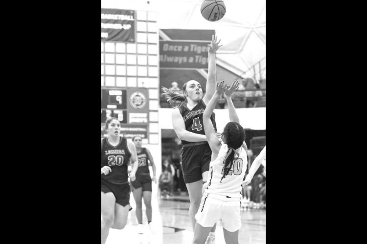 Defense pushes Lomega past Latta