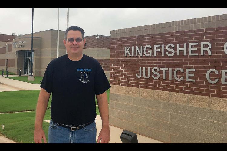 DENNIS BANTHER stands outside the Kingfi sher County Criminal Justice Center in December 2020. Moving from the old jailhouse to the new facility was just one of many major changes the sheriff’s offi ce made during Banther’s tenure, which will come to a close at the end of this year. [KT&FP Staff Photo]