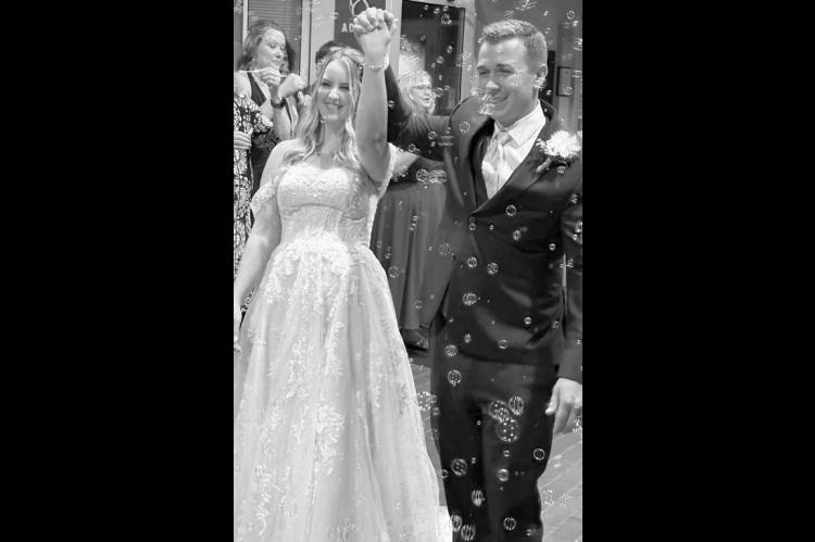 Mr. &amp; Mrs. Ross Reid