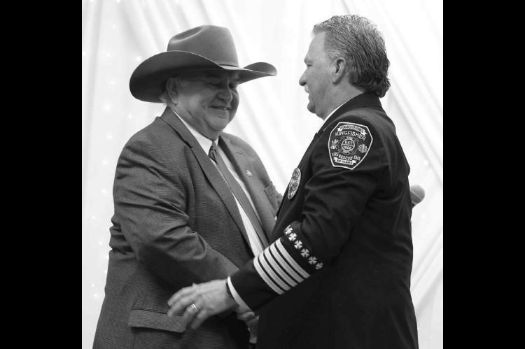 Retiring fire chief presented with surprise honor