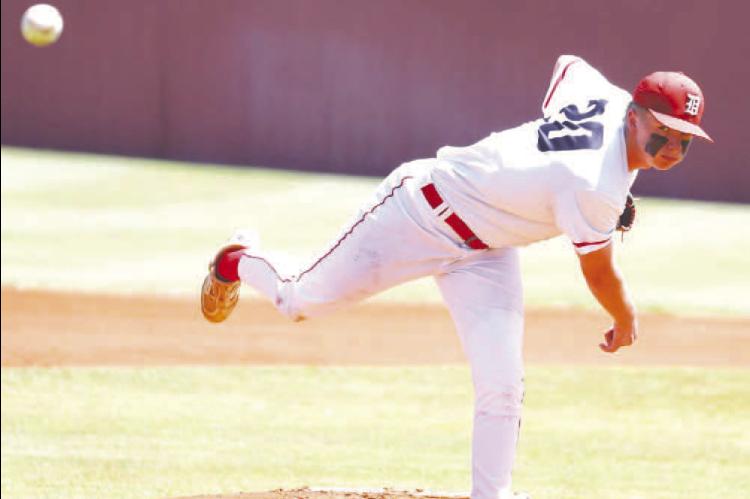 TRYPP LACK watches as his pitch approaches the plate during the first game of Dover’s district sweep of Sweetwater on Thursday. Lack allowed just one hit and struck out 11 over six innings. [KT&amp;FP Staff Photo]