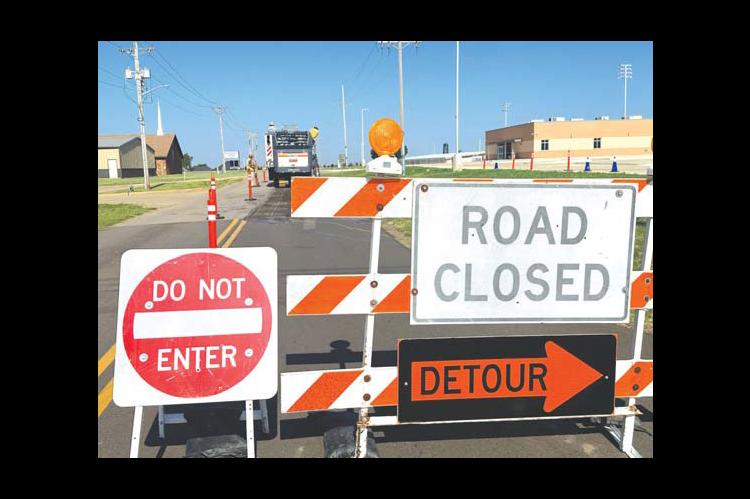 	CAUTION: ROAD WORK AHEAD