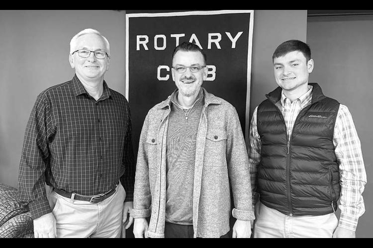 ROTARY SPEAKER – Larry Reece, associate athletic director at Oklahoma State University, center, was the guest speaker of the Kingfisher Rotary Club recently. Pictured with Rotarian Darcy Jech, left, and guest Peyton Burns, right, Reece spoke of the stee