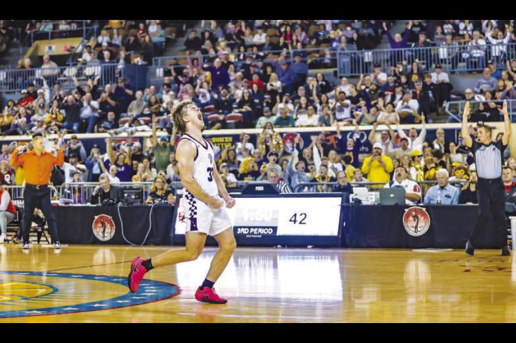 WARRIOR YELL – Okarche’s Easton Roby reacts after making his second of two consecutive 3-pointers to give his team a 45-35 lead with under 2 minutes to play in the third quarter of Saturday’s Class A state championship game against Okay. The 10-poin