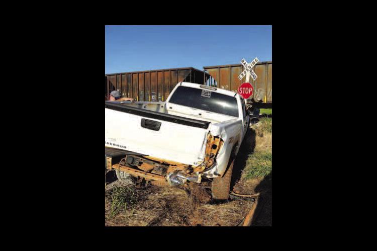 Teens suffer minor injuries after vehicle struck by train
