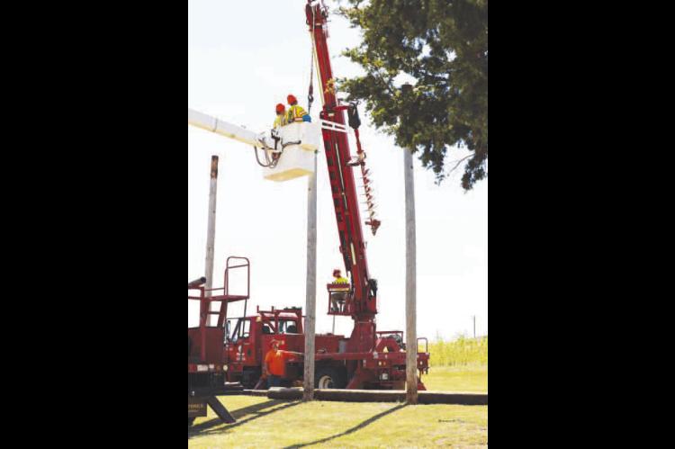 PIONEER CREWS take part in a recent training exercise at Chisholm Trail Technology Center. CTTC was awarded a grant for more than $500,000, which it will use to help train some 200 Pioneer employees over the next several months. [Photo provided]