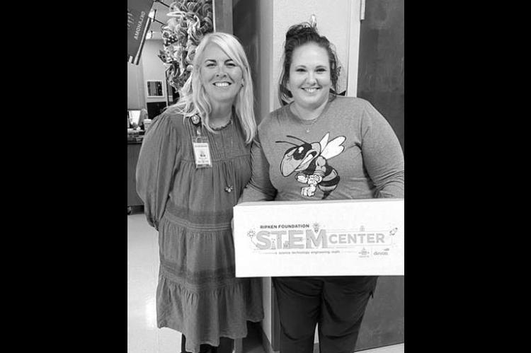 Devon makes donation to KPS STEM program