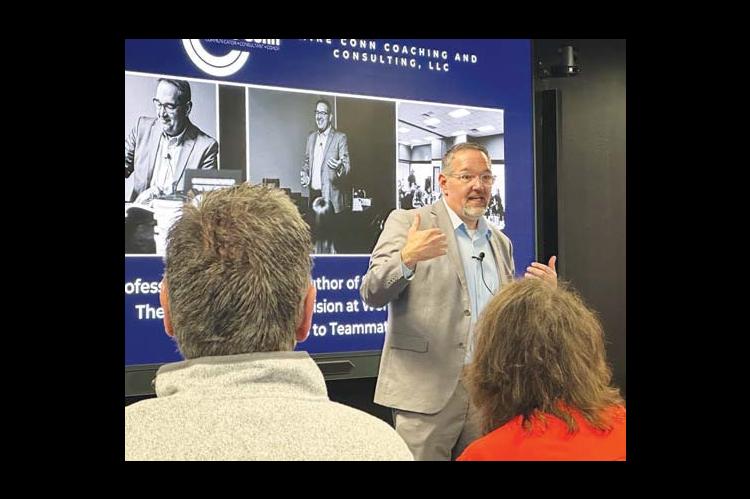 MIKE CONN addressed a group of about 70 business leaders Wednesday at the Chamber of Commerce Biz-Connect Luncheon. [KT&FP Staff Photo]