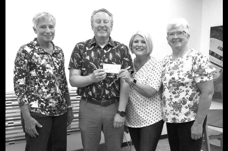 Altar Society makes $9K in donations to local groups