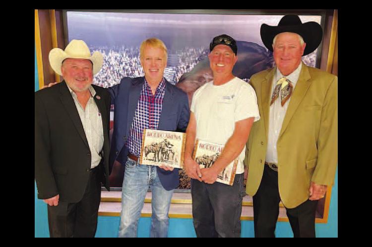 CASHION NATIVES and cousins Mark and Trey Beutler (second and third from left) attended a book signing last week for their cousins from Elk City, Randy (far left) and Bennie (far right) Beutler. The Elk City faction is nationally famous for its rodeo stoc