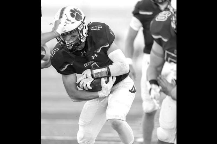 CASHION SENIOR Hank Brown had a big night rushing the ball and also had a long touchdown reception, but Fairview scored late to down Cashion in a 42-35 shotout Friday. [Photo by Brad Stone/www.bestone.shootproof.com]