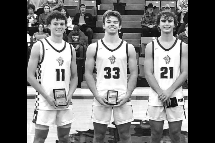 OKARCHE’S TRIO of Jett Mueggenborg (11), Easton Roby (33) and Hunter Mueggenborg (21) were named to the all-tournament team at Leedey last week. Jett Mueggenborg was named MVP. [Photo provided]