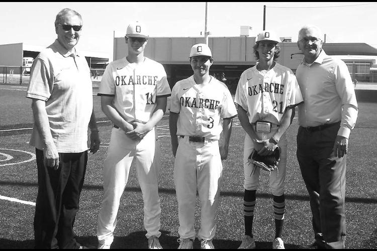Okarche celebrated its baseball seniors prior to the fi nal regular season home game on April 17. Guests of honor included State Sen. Jack Stewart (R-Yukon) and Sen. Darcy Jech (R-Kingfi sher). Jech is pictured on the left throwing out a ceremonial fi rst pitch prior to the Warriors’ 15-0 win over Watonga. Pictured on the right are, from left: Stewart, Okarche seniors Landon Goble, Landon Weeres and Jake Hendrickson, and Jech.