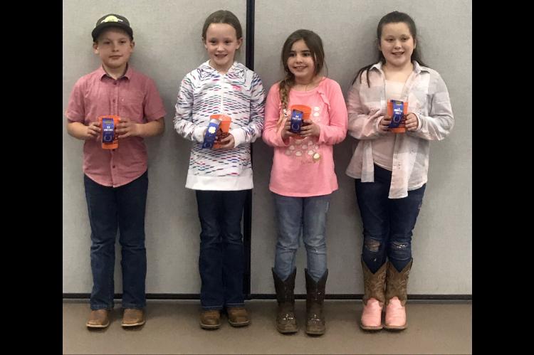 The Lomega 4-H team consisting, from left, Breckon Murray, Josey Nusz, Lasi Grabow and Sadee Wright won the livestock quiz bowl recently during the Kingfisher County Spring Livestock Show.             [Photo provided]