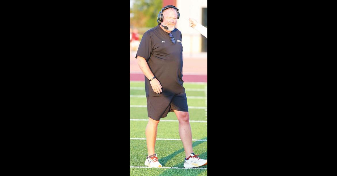 KINGFISHER AND CASHION face off for the first time in a varsity football game this week. Wildcat coach Lynn Shackelford (left) and KHS head coach Reagan Roof (right) both feel this could - and should - be the first of many showdowns between the two county schools. [KT&FP Staff Photos]