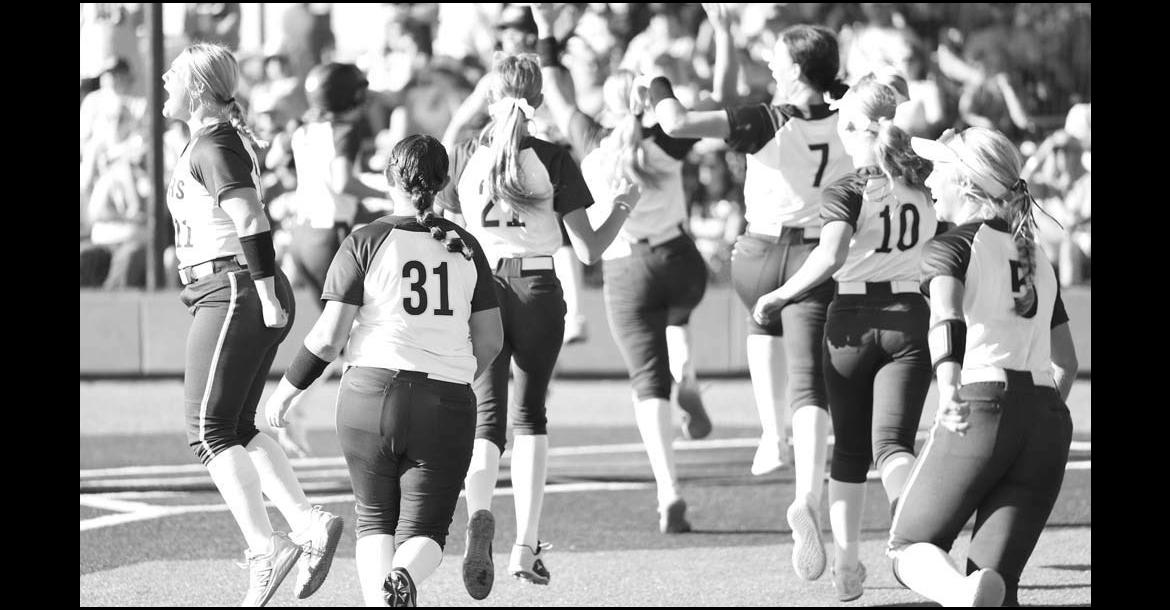 OKARCHE PLAYERS run (and leap) to home plate after Kinley Pruett hit the go-ahead home run during Thursday’s upset of No. 2 Caddo in the Class A state quarterfinals. [KT&amp;FP Staff Photo]