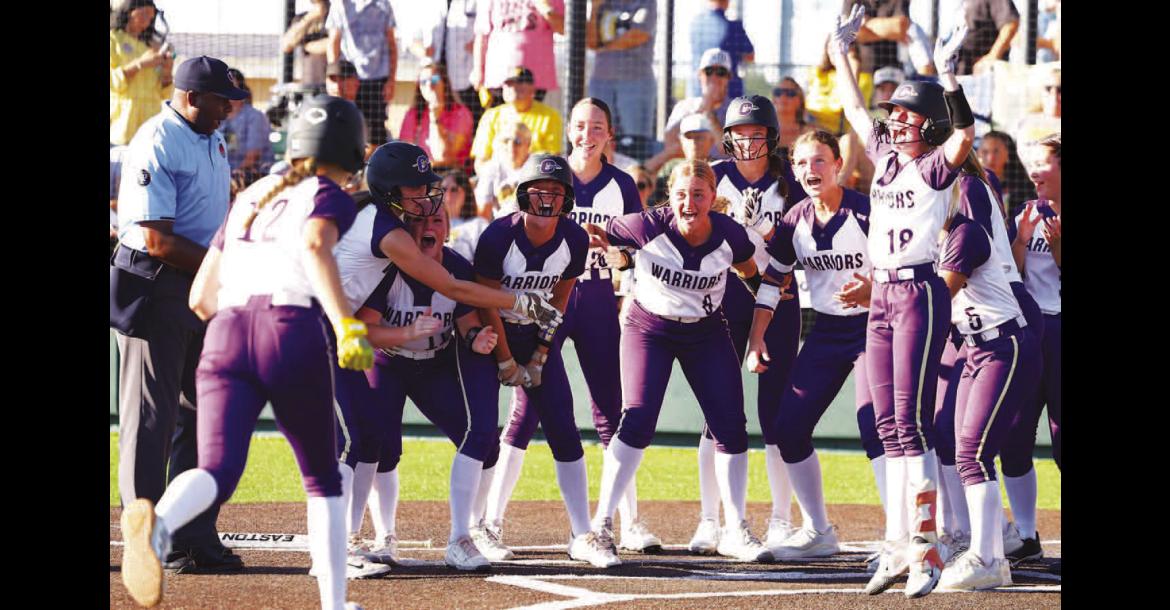 OKARCHE SOFTBALL team members await at home plate for the arrival of Kinley Pruett after she hit a three-run home run in the fifth inning Thursday in the quarterfinal round of the Class A state softball tournament. Pruett’s homer turned a 4-3 deficit into a two-run lead, one the Lady Warriors wouldn’t lose as they knocked off second-ranked Caddo 10-4 to advance to the semifinals. See inside for more. [KT&amp;FP Staff Photo]