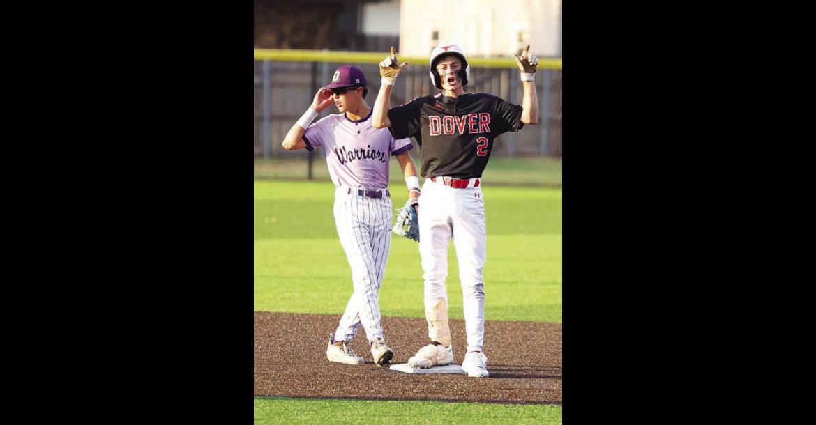 DOVER’S Brok Cooper stands at second base after leading off the top of the seventh with a double. Cooper eventually scored to start a four-run inning for the Longhorns. [KT&amp;FP Staff Photo]
