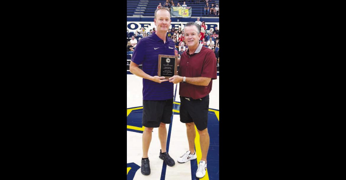 Okarche boys basketball coach was honored last weekend during the Oklahoma Basketball Coaches Association’s annual all-star weekend. West, left, was presented the OBCA’s 2026 Willis Mackey Award for Small-School Coach of the Year. He’s being presented the honor by Kenny Bare of Velma-Alma, the current OBCA president. West guided Okarche to a 29-3 record and its third consecutive Class A state championship during the 2025-26 season. 