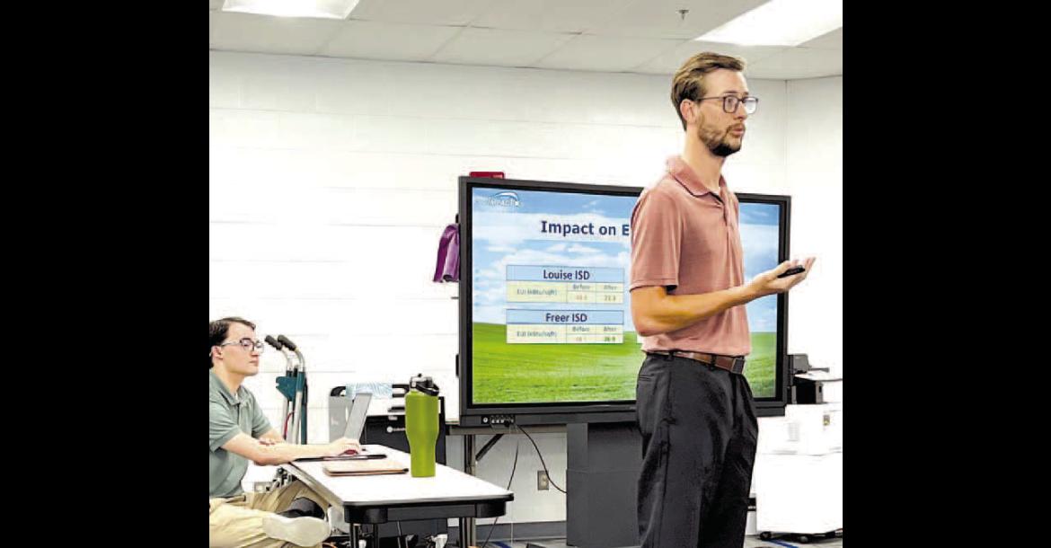 IDEAL IMPACT’S Noah Hines fi rst made a presentation to the Hennessey Board of Education during its May meeting about the company’s ability to save the district money on its utilities bill. The board voted Monday to enter into a contract with the Texas-based company. [KT&FP Staff Photo by Barb Walter]