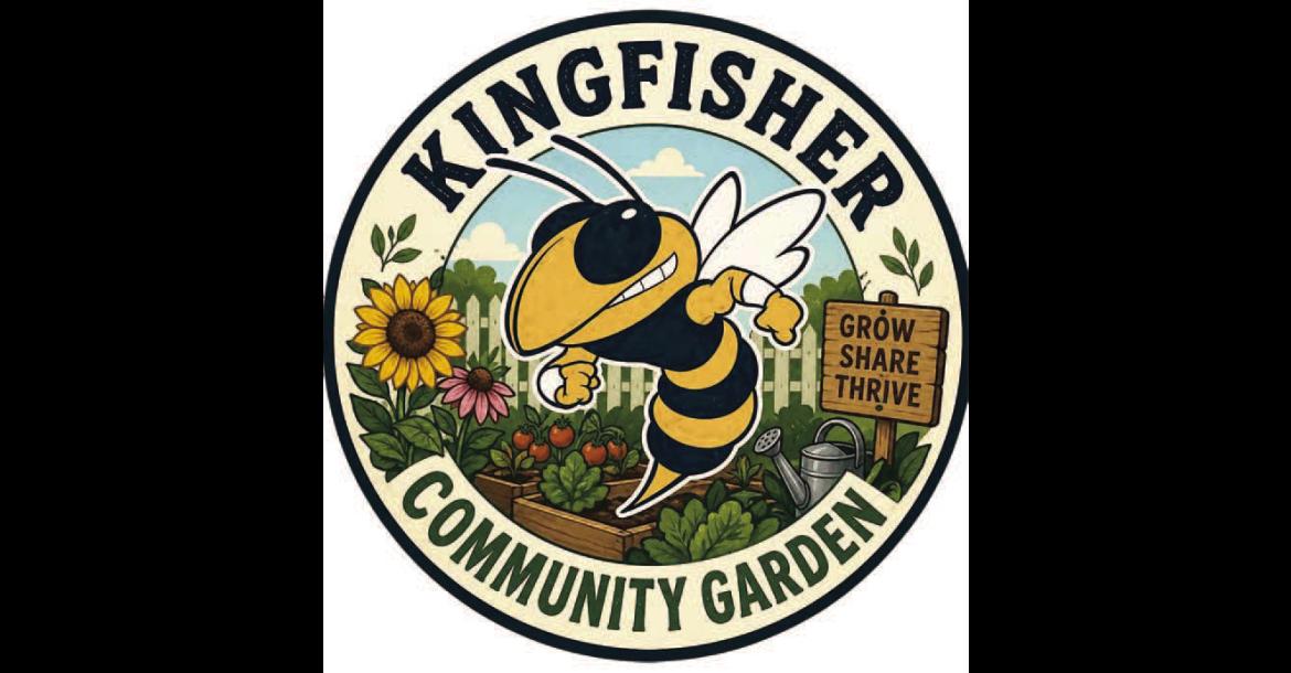 Group plants seed for community garden