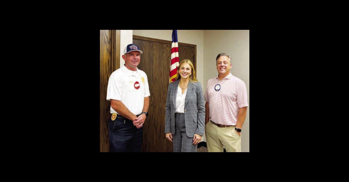 KINGFISHER FIRE Chief Ryan Gibson, left, a Kingfisher Lions Club member, is pictured with Jessica Winegeart, center, who will soon be the state senator for District 26. Also pictured is Kingfisher Lions Club President Michael Swisher. Winegeart spoke to the civic group on Thursday. [KT&amp;FP Staff Photo]