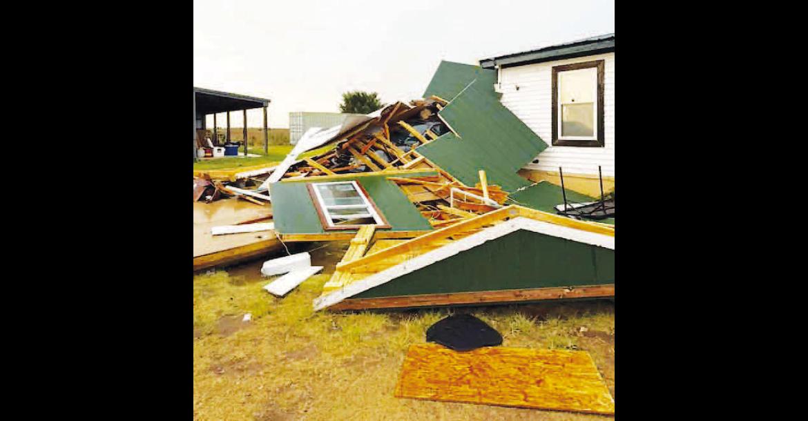FRIDAY STORMS damaged this structure northwest of Kingfisher on County Road E760 (Lemon Road west of U.S. Highway 81). It was one of several structures damaged, including a number of power poles owned by Cimarron Electric. [Photo provided]