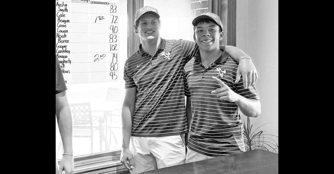 RECENT KHS grads Cale Reagan (left) and Luciano Orozco pose for a pic after completing their rounds at the Classic Bowl golf tournament. Reagan shot a 72 to win the boys tournament while Orozco shot an 80. [Photo provided]