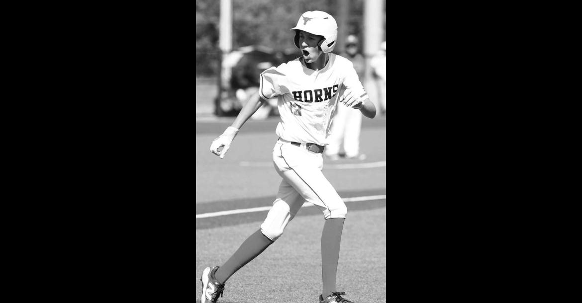 DOVER’S ETHAN DAYTON tries to fire up the Dover dugout after drawing a walk during the fourth inning of the Longhorns’ semifinal loss to Fort Cobb-Broxton. [KT&amp;FP Staff Photo]