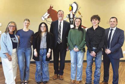 SCHOOL TALK – Shauna Rupp, far left, executive director of the Kingfi sher Chamber of Commerce, hosted with her staff and several directors, a “State of the Schools” luncheon on Wednesday. It included Dr. Sean McDaniel, interim superintendent of Kingfi sher Public Schools, center, and Kurt Thomas, far right, superintendent of Chisholm Trail Technology Center, as the featured speakers. Also speaking at the event were CTTC students, from left, Rilee Long-Bush, Diana Hernandez, Serena Fletcher and Chase Boarts