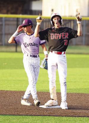 DOVER’S Brok Cooper stands at second base after leading off the top of the seventh with a double. Cooper eventually scored to start a four-run inning for the Longhorns. [KT&amp;FP Staff Photo]