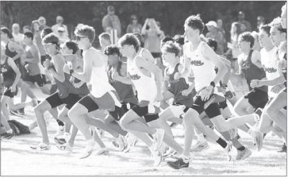 DOVER RUNNERS, from left, Reid Frieouf, Nick Spradlin and Brady Reese race to the front of the pack at the start of last Saturday’s meet in Watonga. [KT&amp;FP Staff Photo]