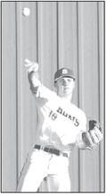 DAXX COMPTON is pictured making a throw from centerfi eld last spring. The Dover junior had homers - including a grand slam - in his only two at-bats on Monday in his team’s season-opening win. [KT&amp;FP Staff Photo]