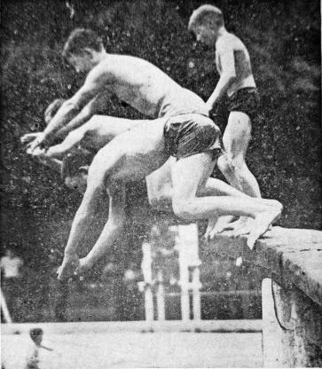 Four boys dive simultaneously into Kingfisher swimming pool, which was opened for the REA picnic Tuesday. The Cimarron Electric Cooperative gave free tickets to members and their families. (Times, Aug. 23, 1951)