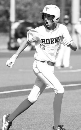 DOVER’S ETHAN DAYTON tries to fire up the Dover dugout after drawing a walk during the fourth inning of the Longhorns’ semifinal loss to Fort Cobb-Broxton. [KT&amp;FP Staff Photo]
